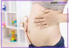 مشکلات سه ماهه اول بارداری شکم خانم باردار در ماه‌های اول بارداری