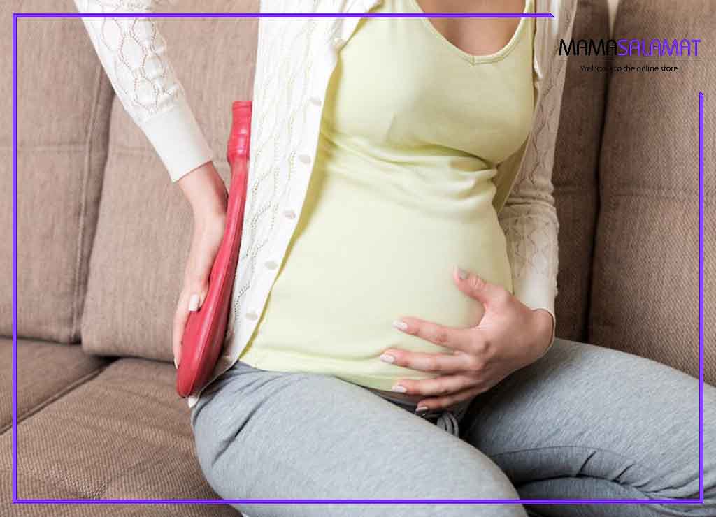 کمردرد بارداری تسکین درد کمر خانم باردار با کیسه آب گرم